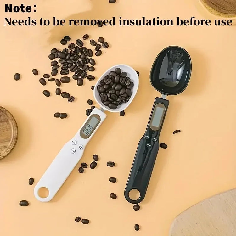 White and black ACCUSCOOP spoons with coffee beans